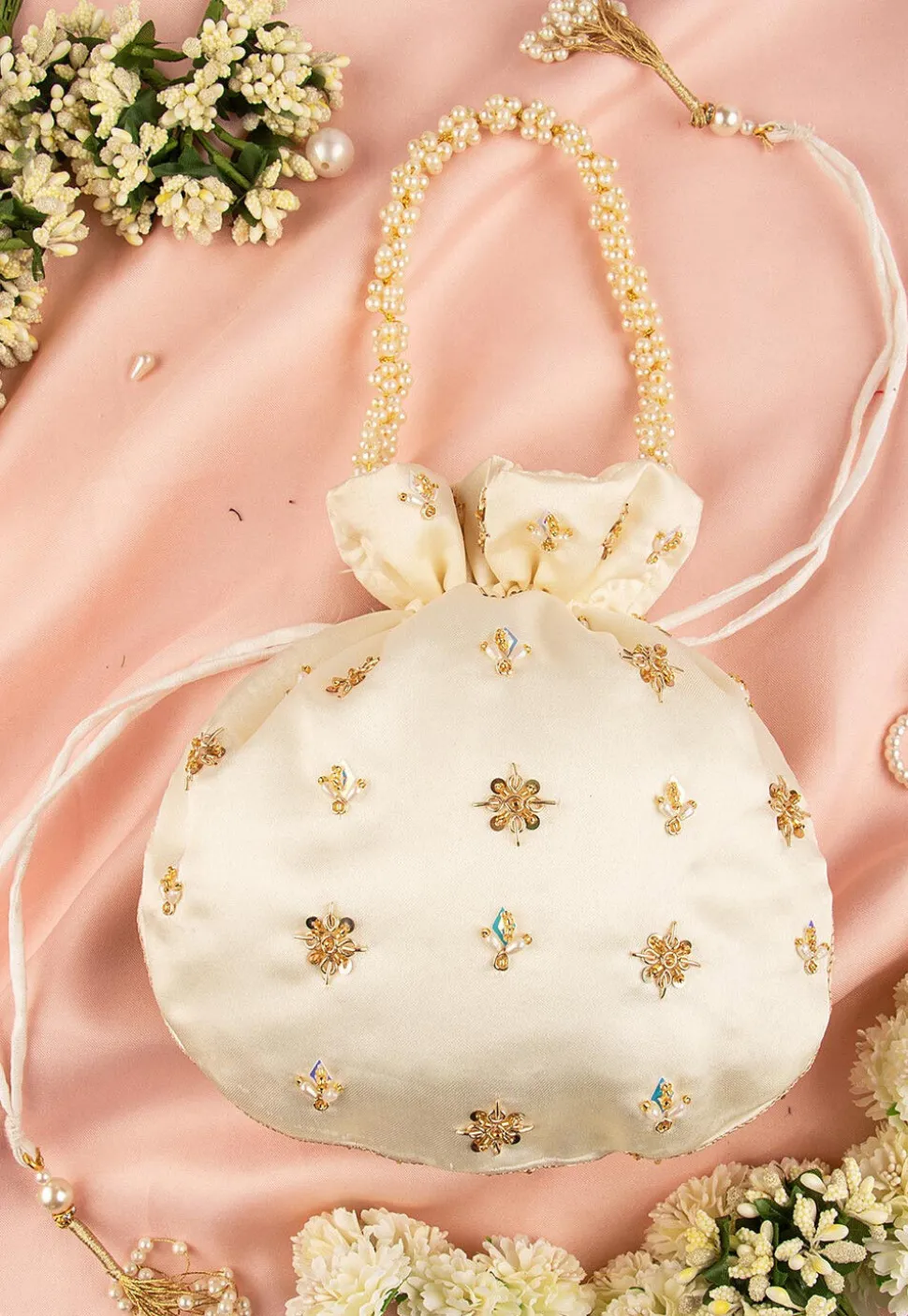 Hand Embroidered Art Silk Potli Bag in Off White