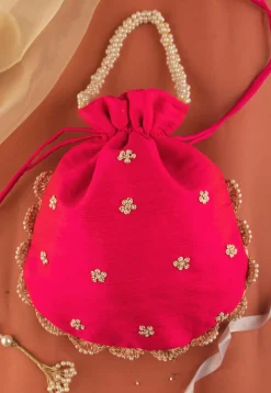 Hand Embroidered Art Silk Potli Bag in Fuchsia