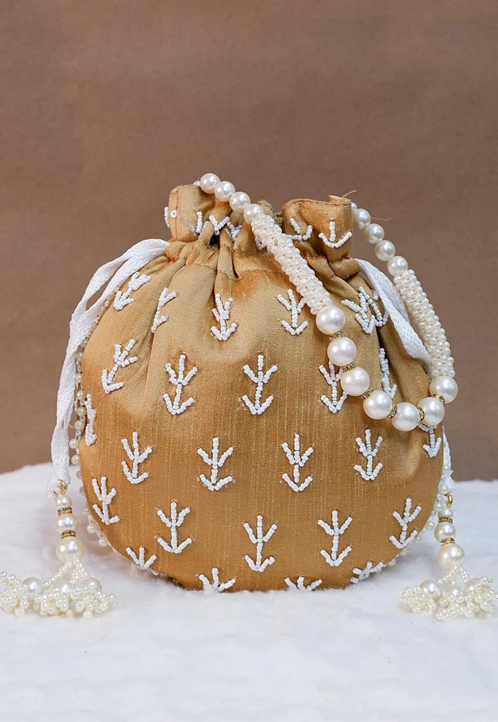 Hand Embroidered Art Silk Potli Bag in Beige