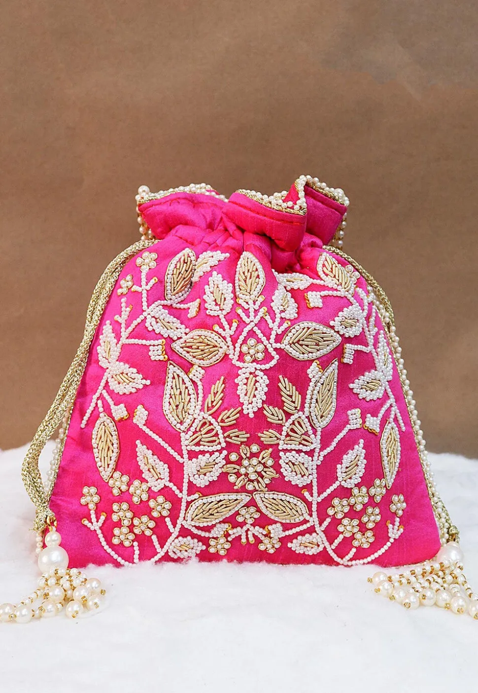 Hand Embroidered Art Silk Potli Bag in Fuchsia