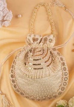 Hand Embroidered Art Silk Potli Bag in Beige