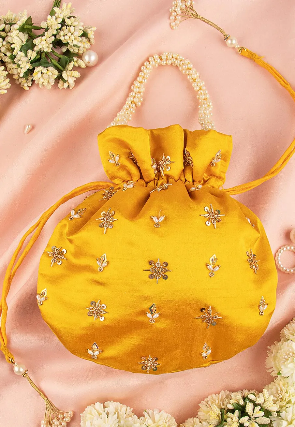 Hand Embroidered Art Silk Potli Bag in Yellow