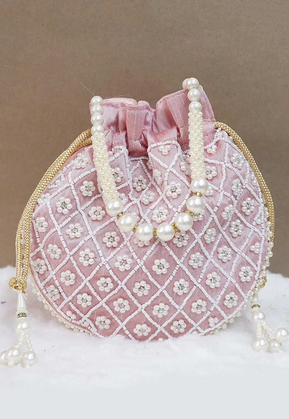 Hand Embroidered Art Silk Potli Bag in Light Peach