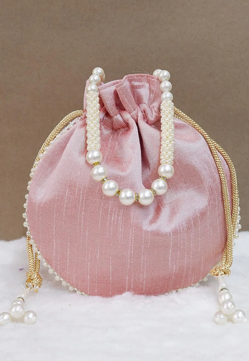Hand Embroidered Art Silk Potli Bag in Light Peach