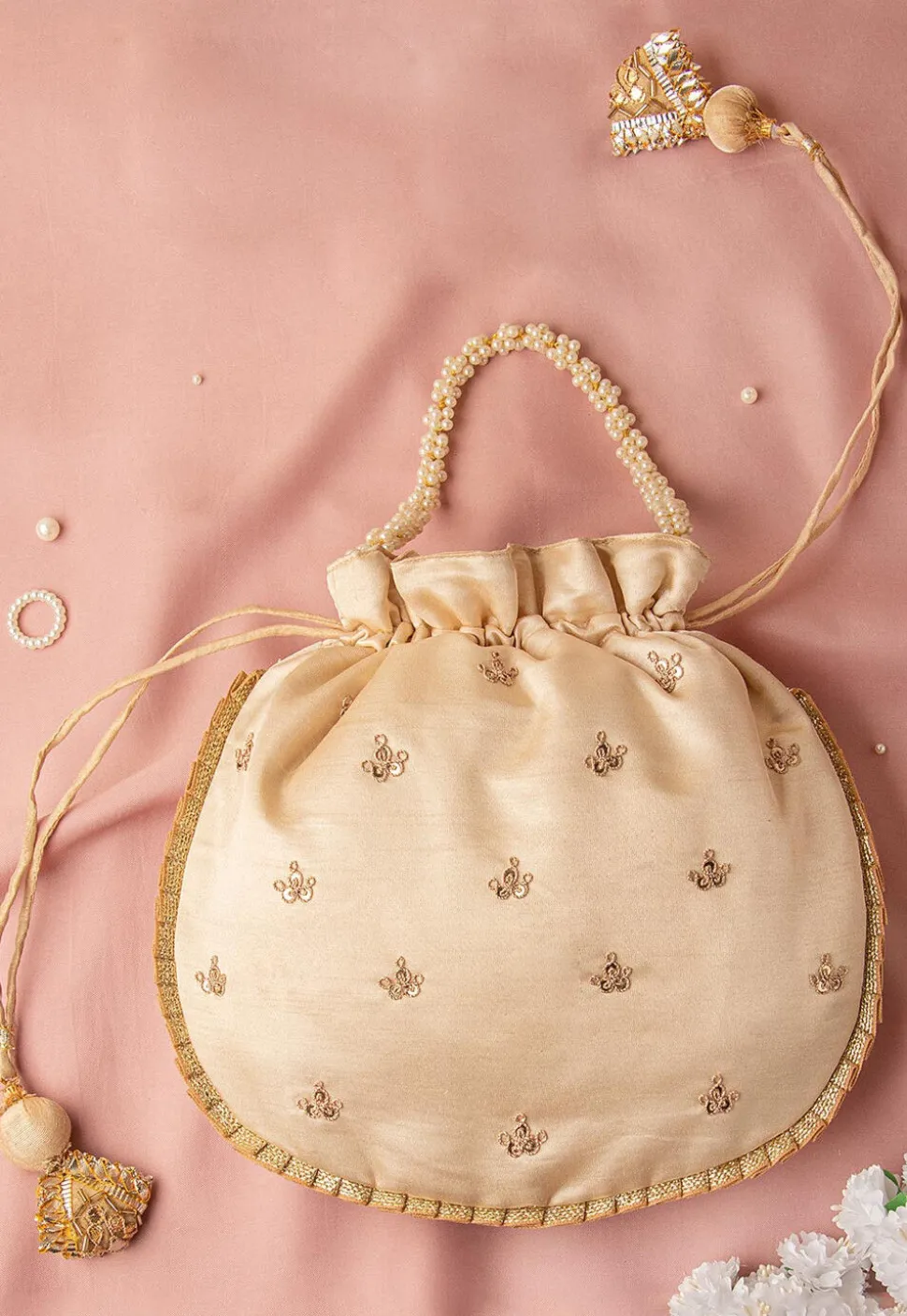 Hand Embroidered Art Silk Potli Bag in Beige
