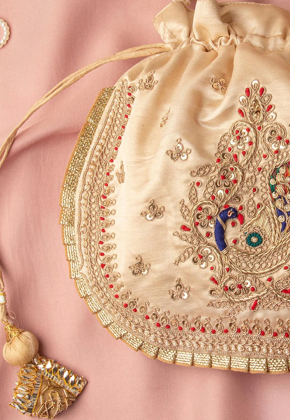 Hand Embroidered Art Silk Potli Bag in Beige