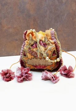 Hand Embroidered Art Silk Potli Bag in Dark Mustard