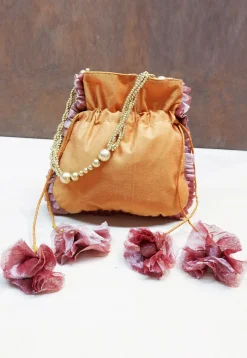 Hand Embroidered Art Silk Potli Bag in Dark Mustard