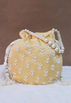 Hand Embroidered Art Silk Potli Bag in Light Beige