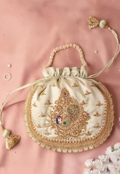 Hand Embroidered Art Silk Potli Bag in Pastel Green