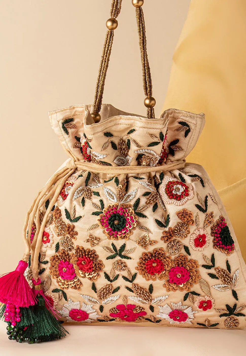 Hand Embroidered Art Silk Potli Bag in Beige
