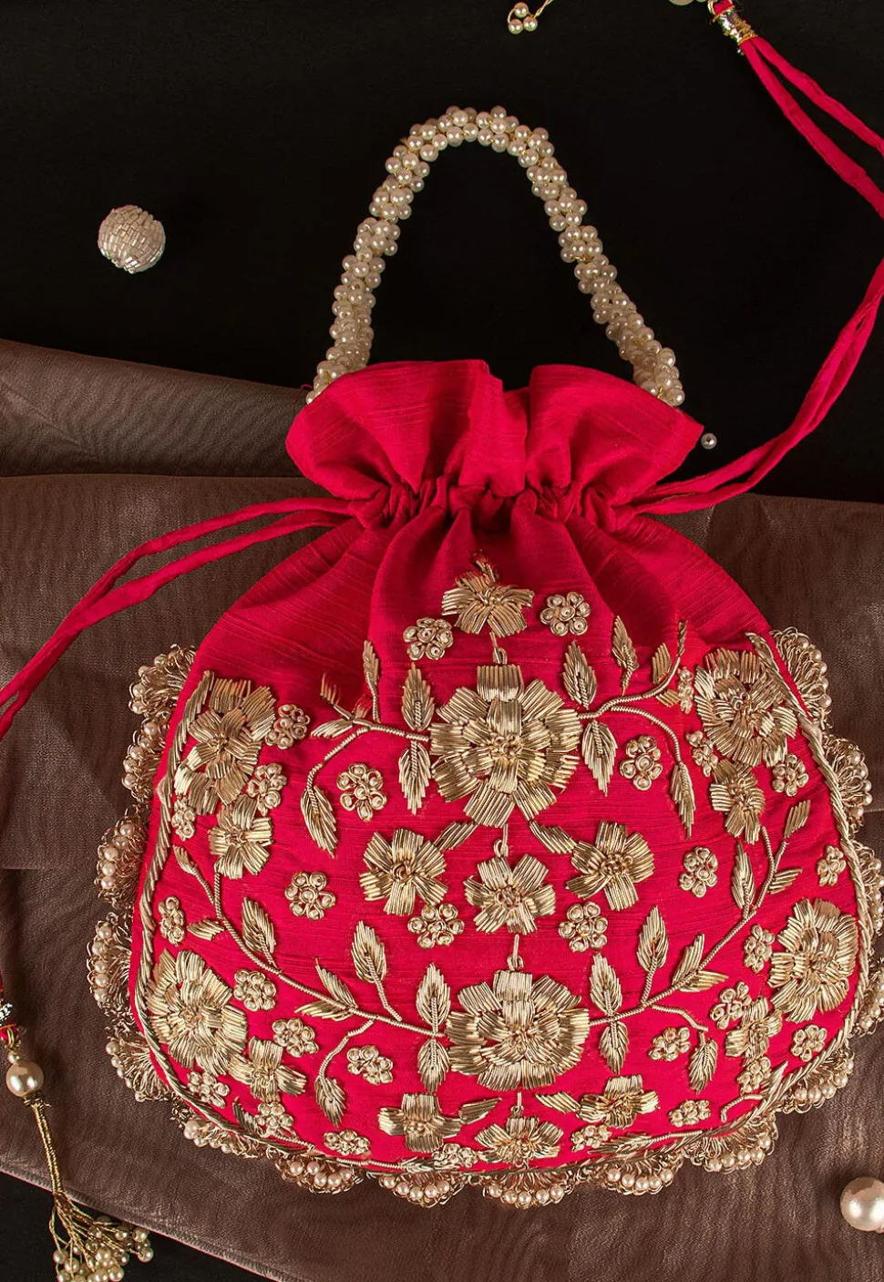 Hand Embroidered Art Silk Potli Bag in Red