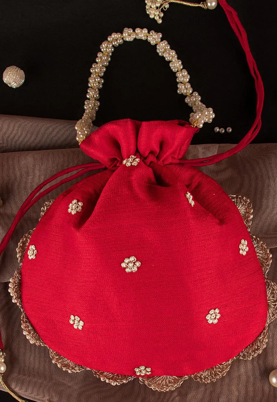 Hand Embroidered Art Silk Potli Bag in Red