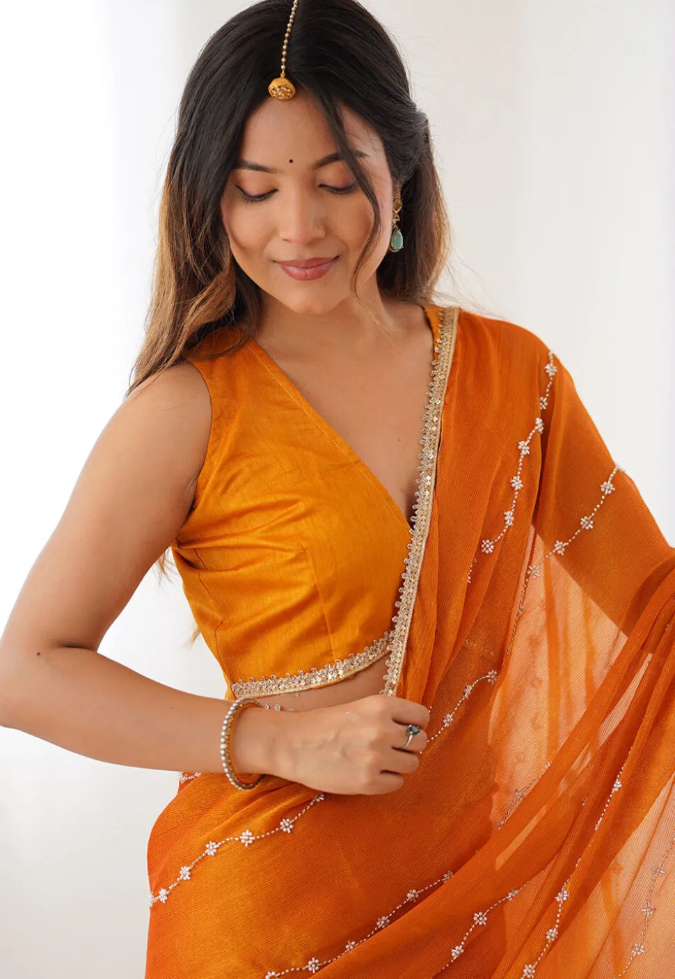 Hand Embroidered Chiffon Saree in Orange