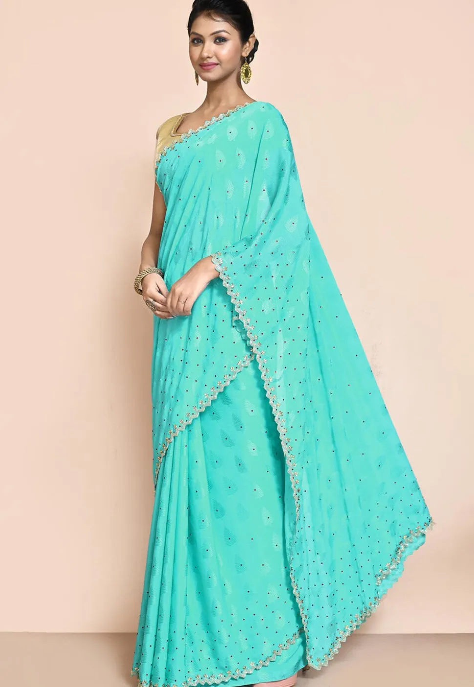 Hand Embroidered Chiffon Jacquard Saree in Turquoise