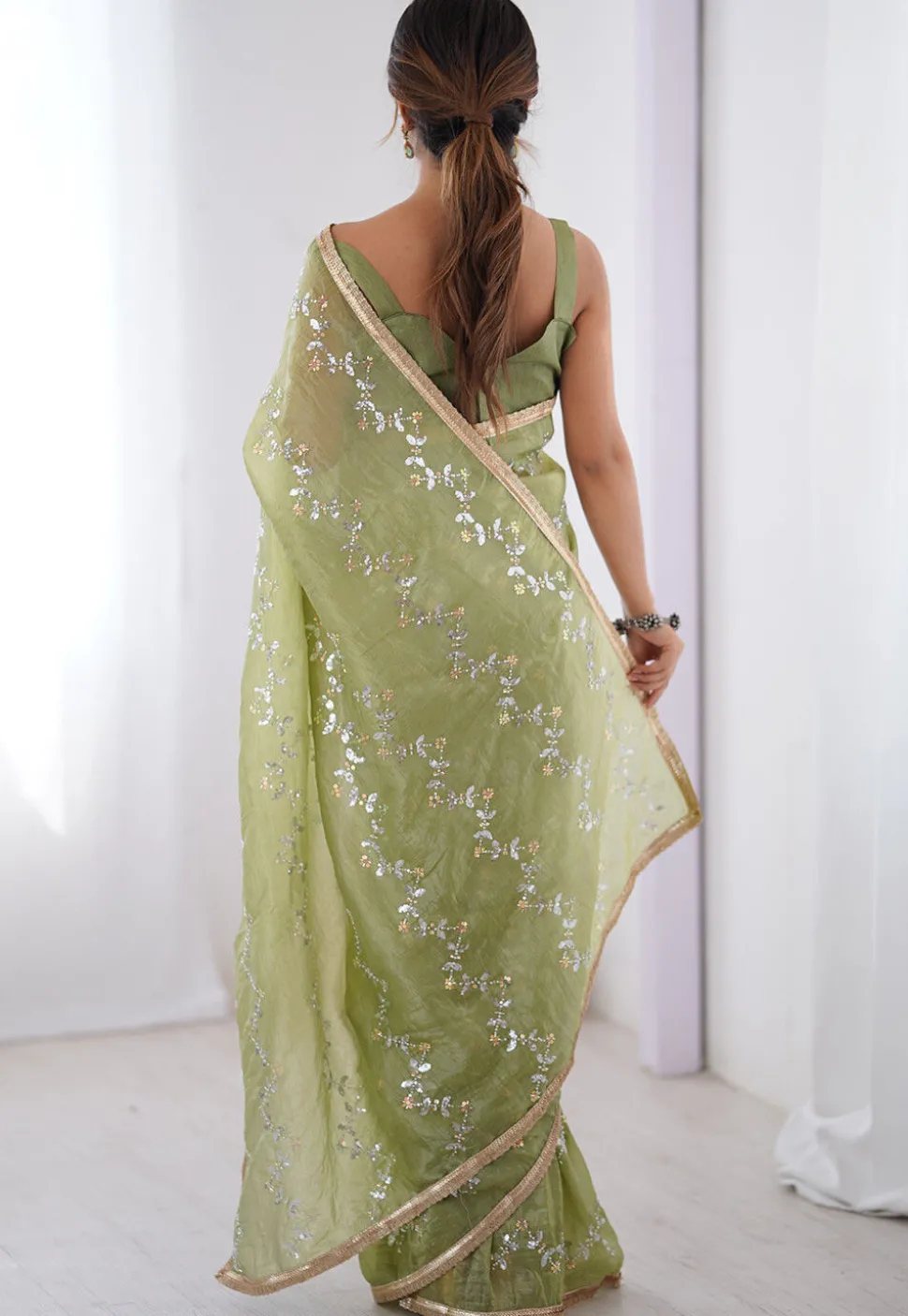 Hand Embroidered Tissue Saree in Green