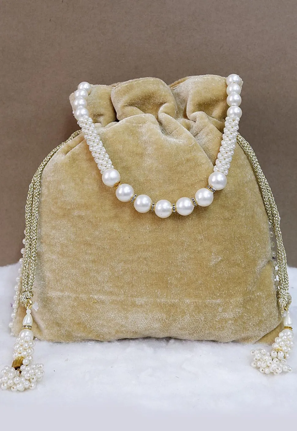 Hand Embroidered Velvet Potli Bag in Beige