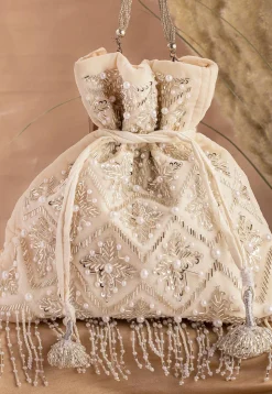 Hand Embroidered Velvet Potli Bag in Off White