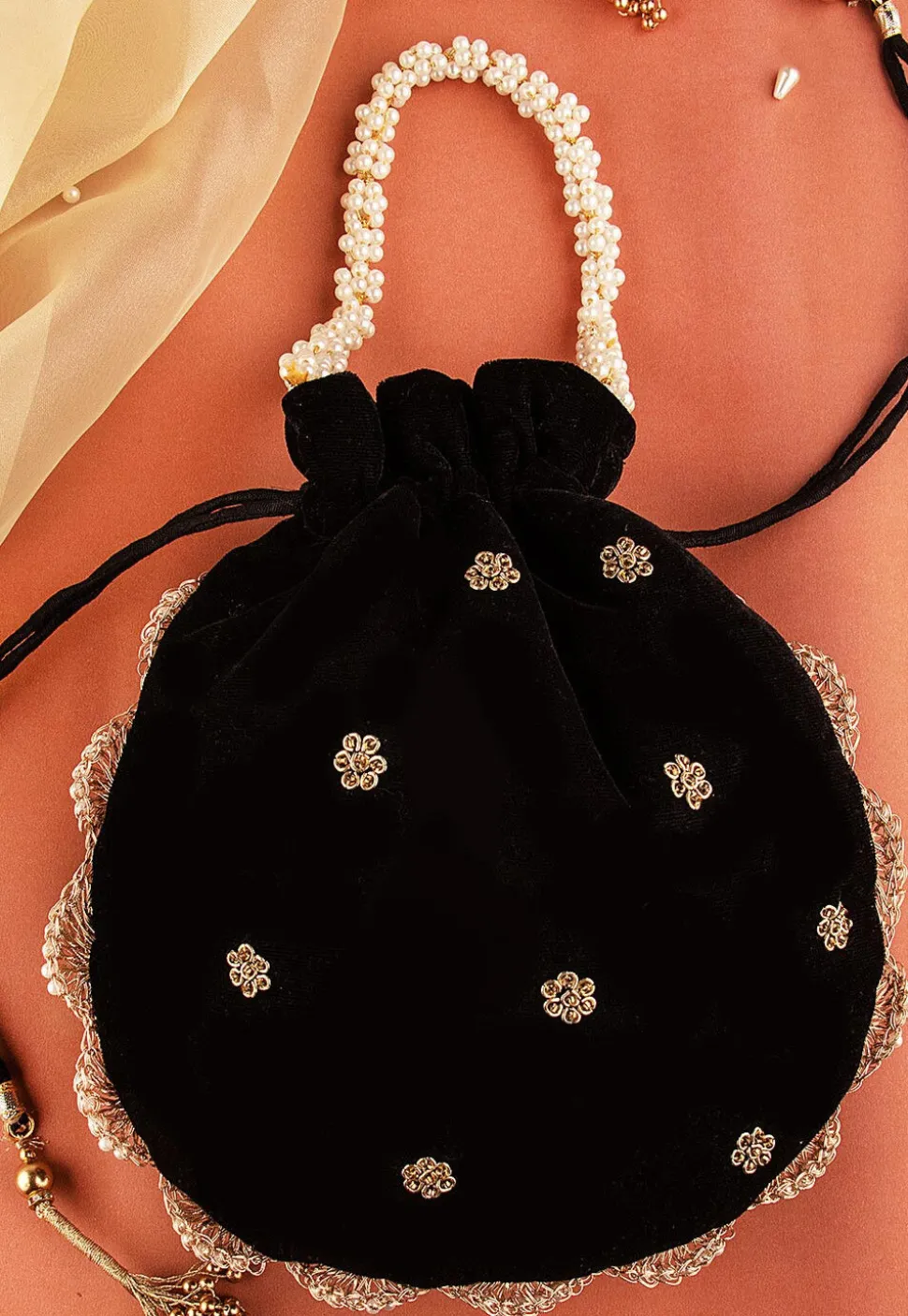 Hand Embroidered Velvet Potli Bag in Black