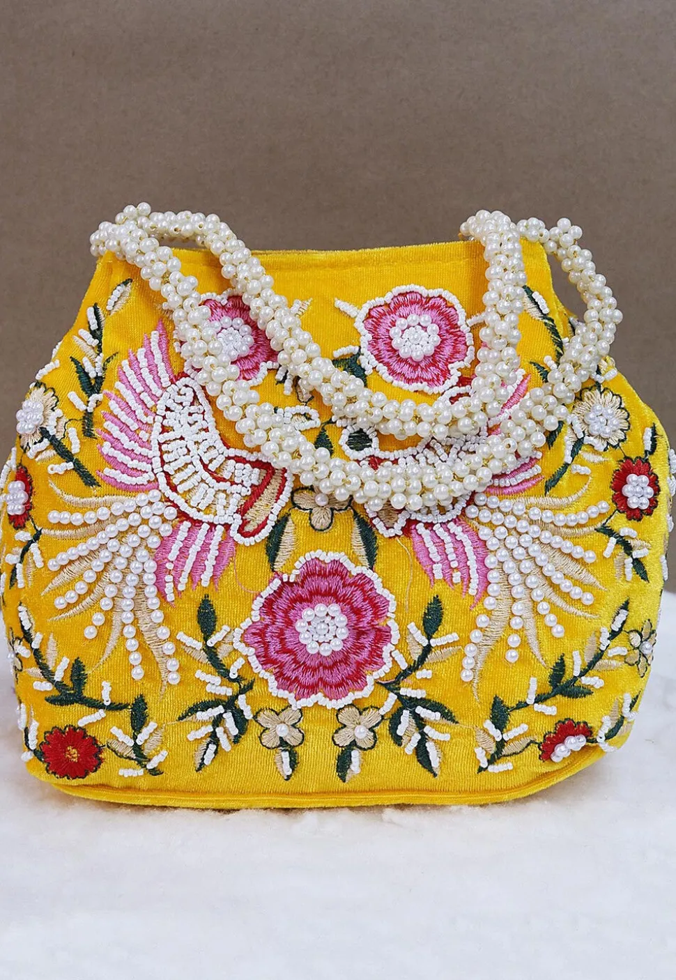 Hand Embroidered Velvet Potli Bag in Yellow