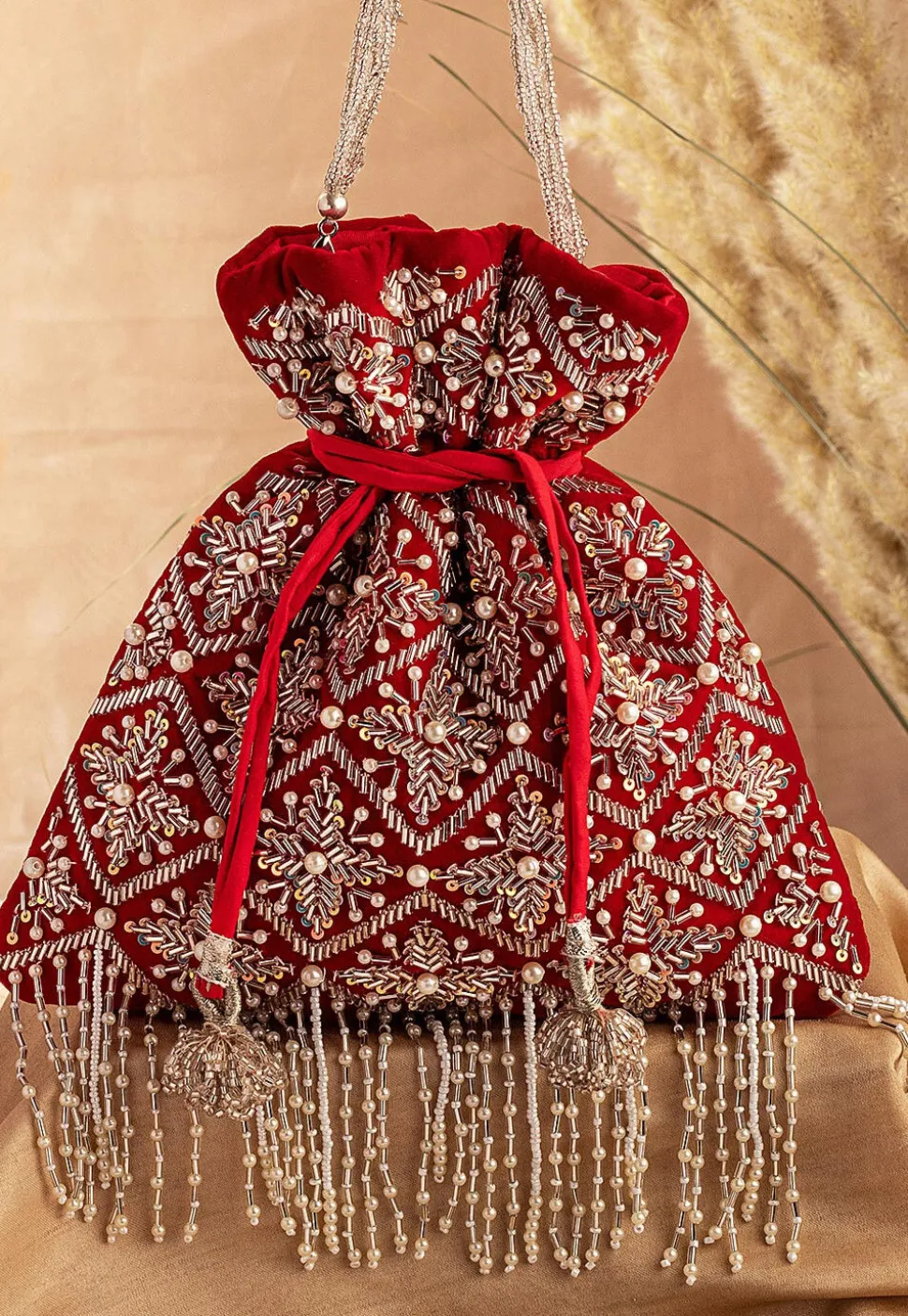 Hand Embroidered Velvet Potli Bag in Red