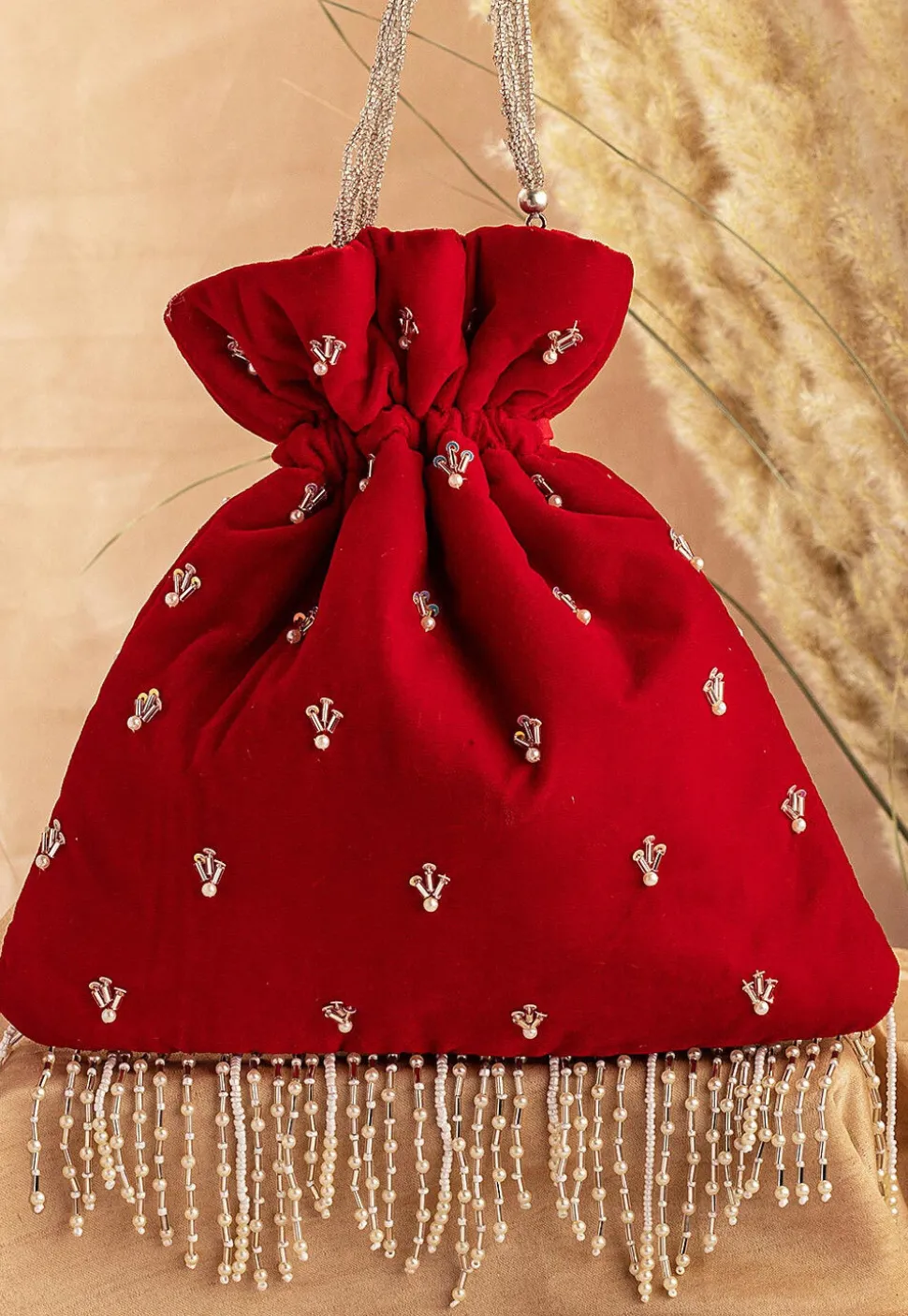 Hand Embroidered Velvet Potli Bag in Red