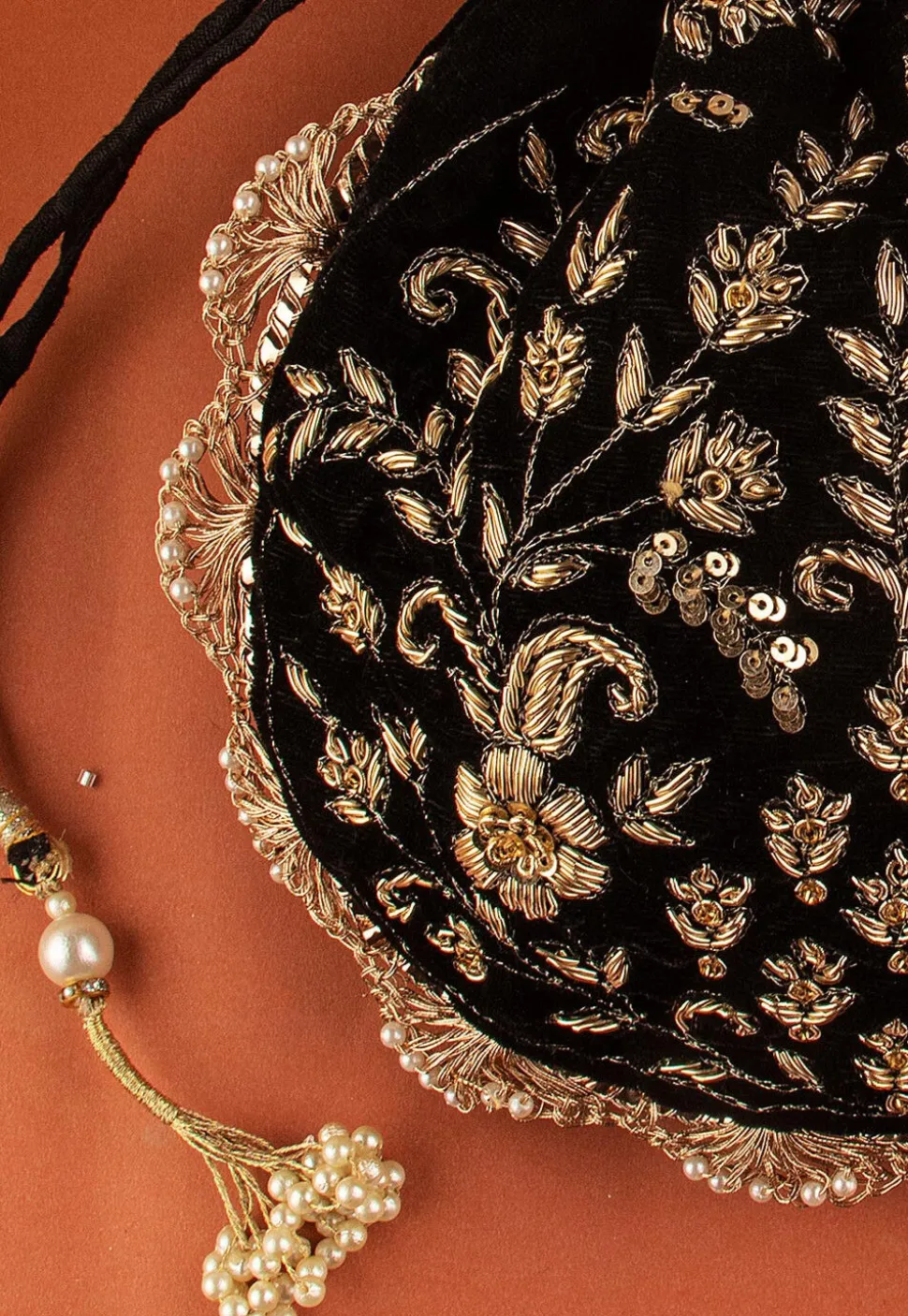 Hand Embroidered Velvet Potli Bag in Black