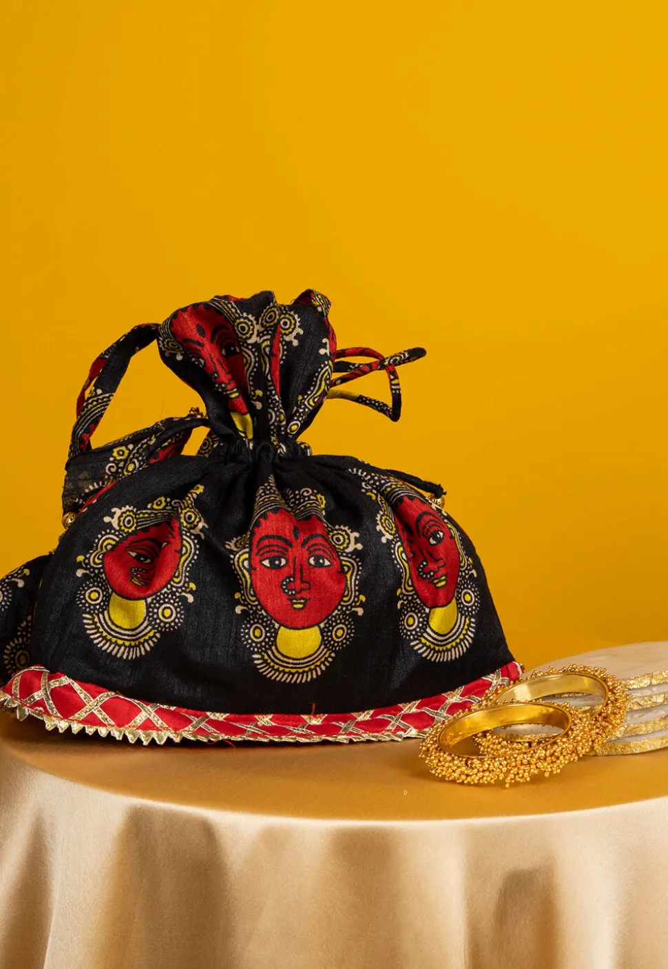 Kalamkari Printed Art Silk Potli Bag in Black