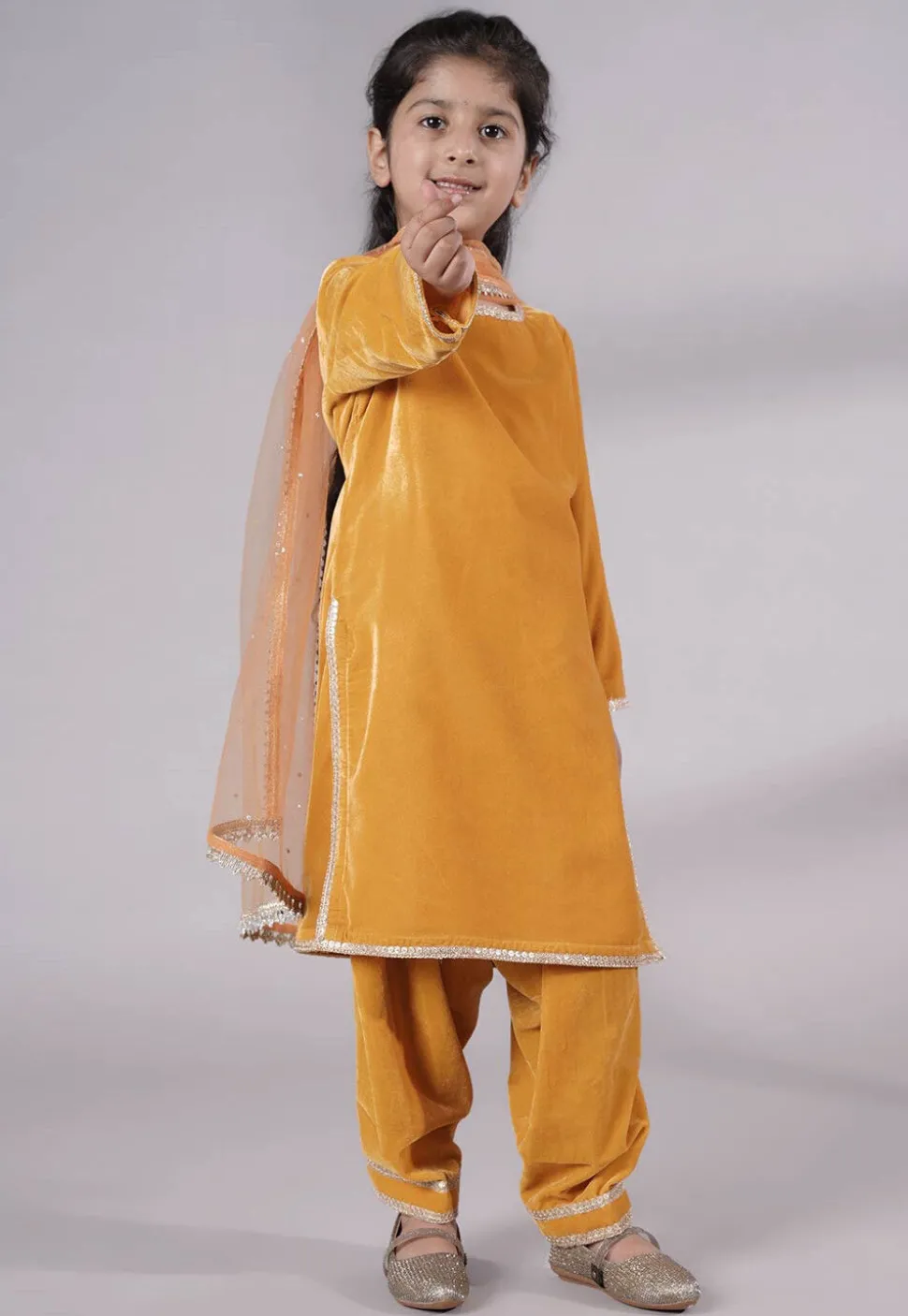 Lace Border Velvet Punjabi Suit in Mustard