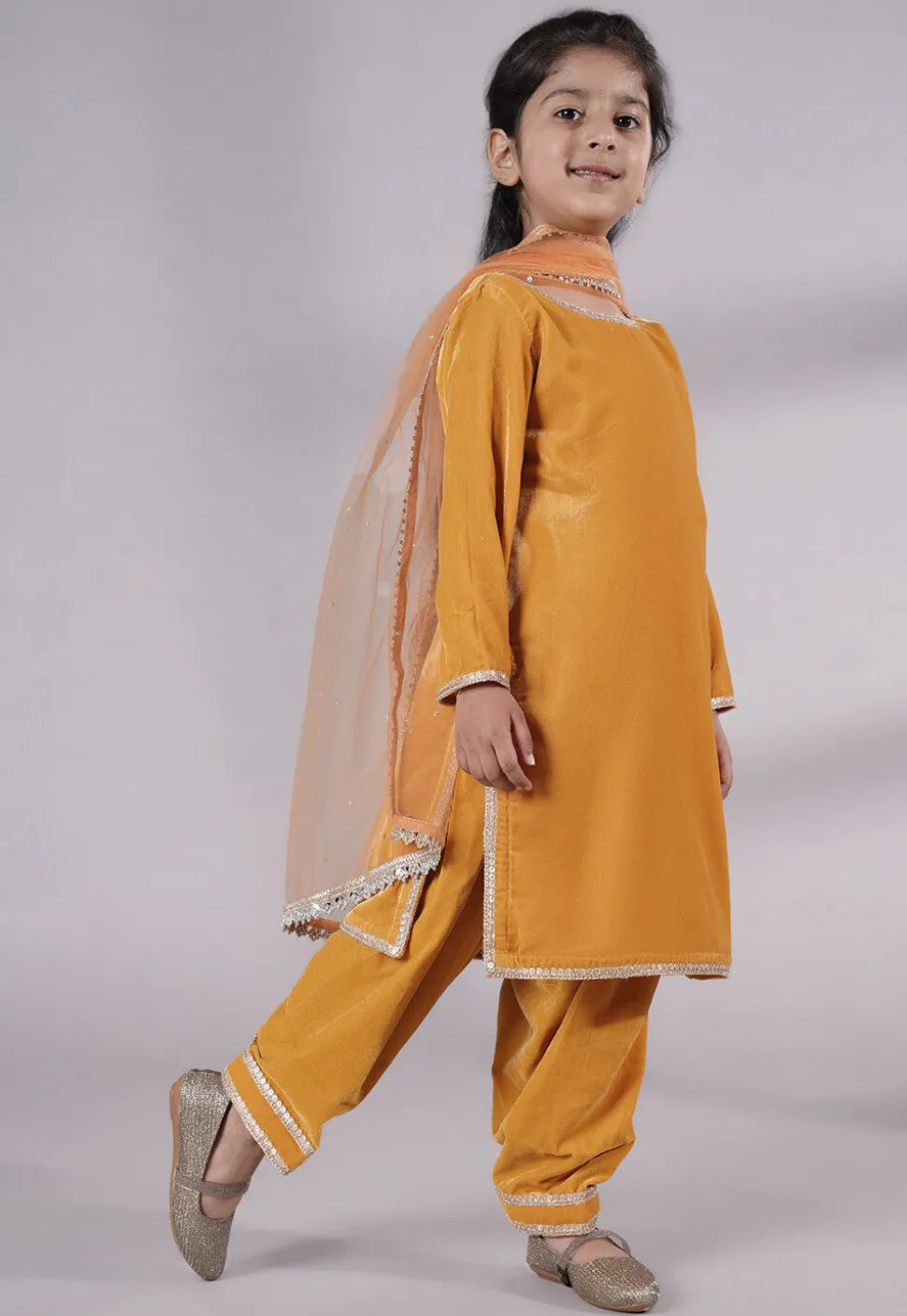Lace Border Velvet Punjabi Suit in Mustard