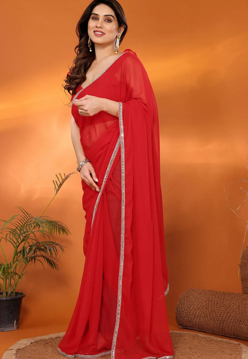 Lace Embellished Georgette Saree in Red