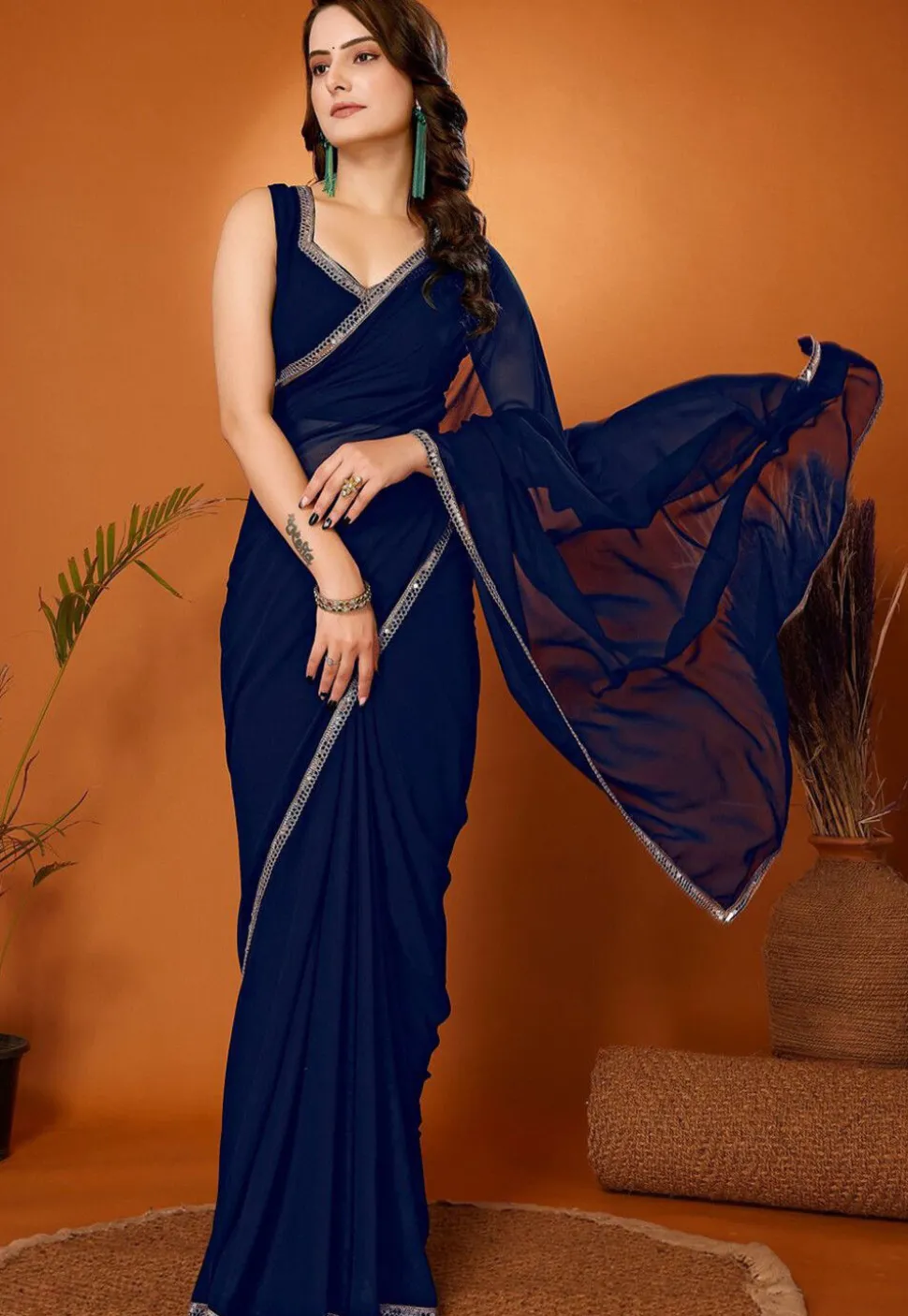 Lace Embellished Georgette Saree in Navy Blue
