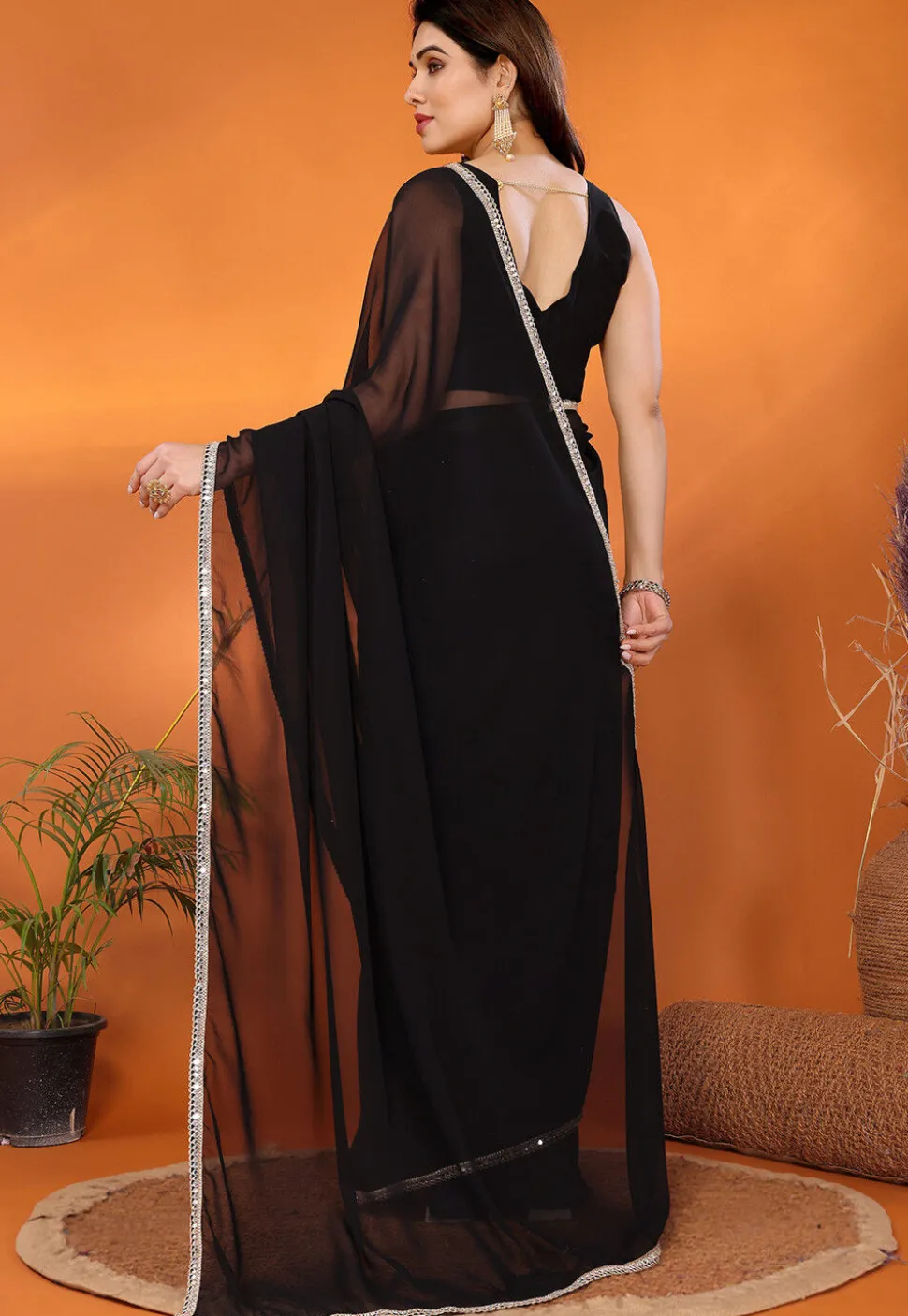 Lace Embellished Georgette Saree in Black