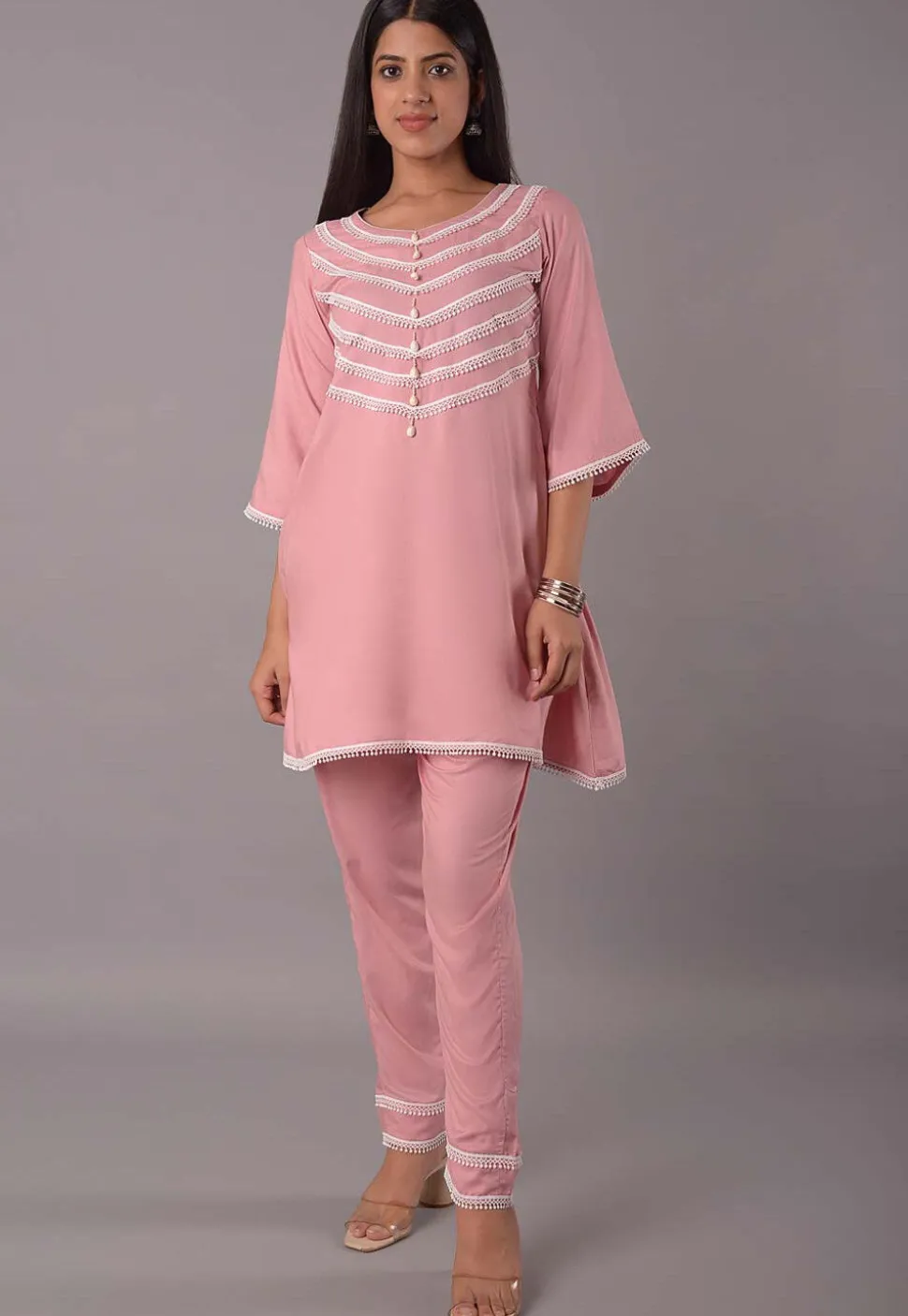 Lace Embellished Rayon Pakistani Suit in Peach