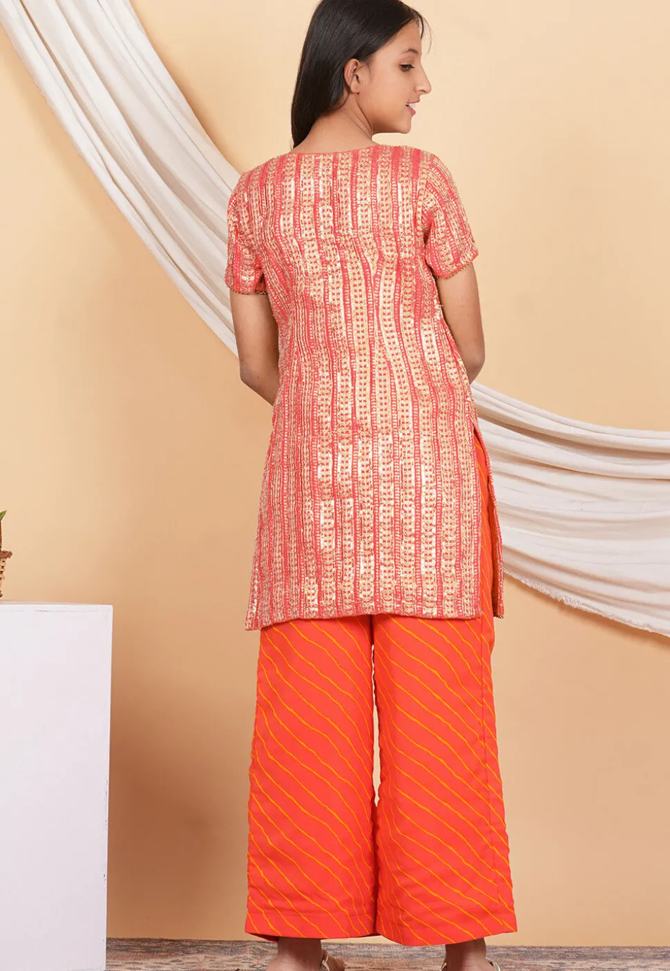 Leheriya Printed Georgette Pakistani Suit in Peach