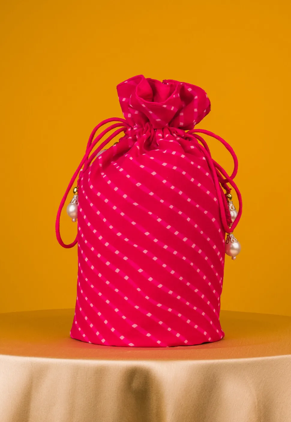 Leheriya Printed Georgette Potli Bag in Fuchsia