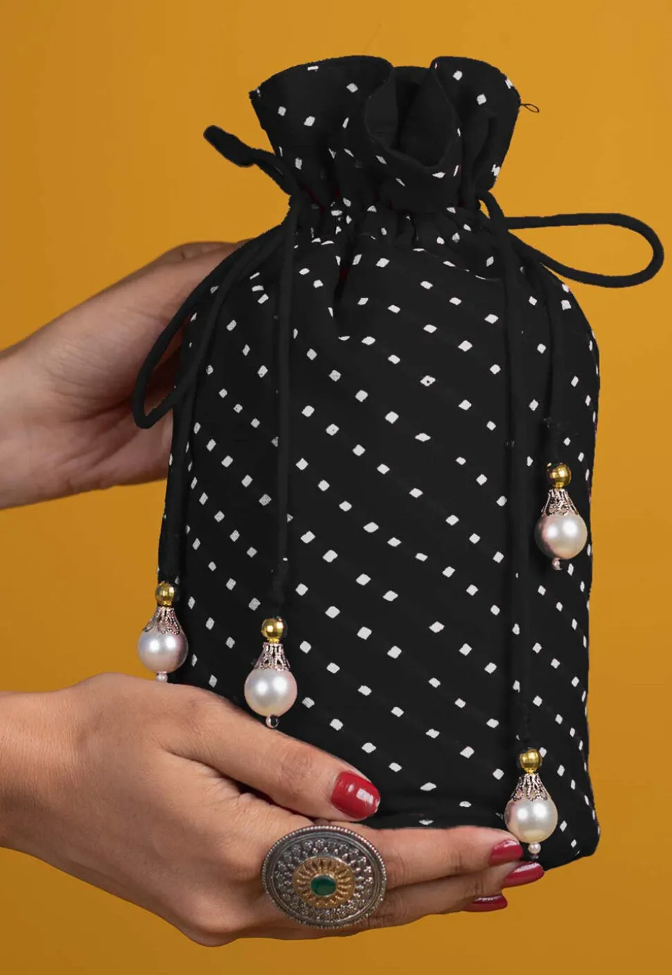 Leheriya Printed Georgette Potli Bag in Black
