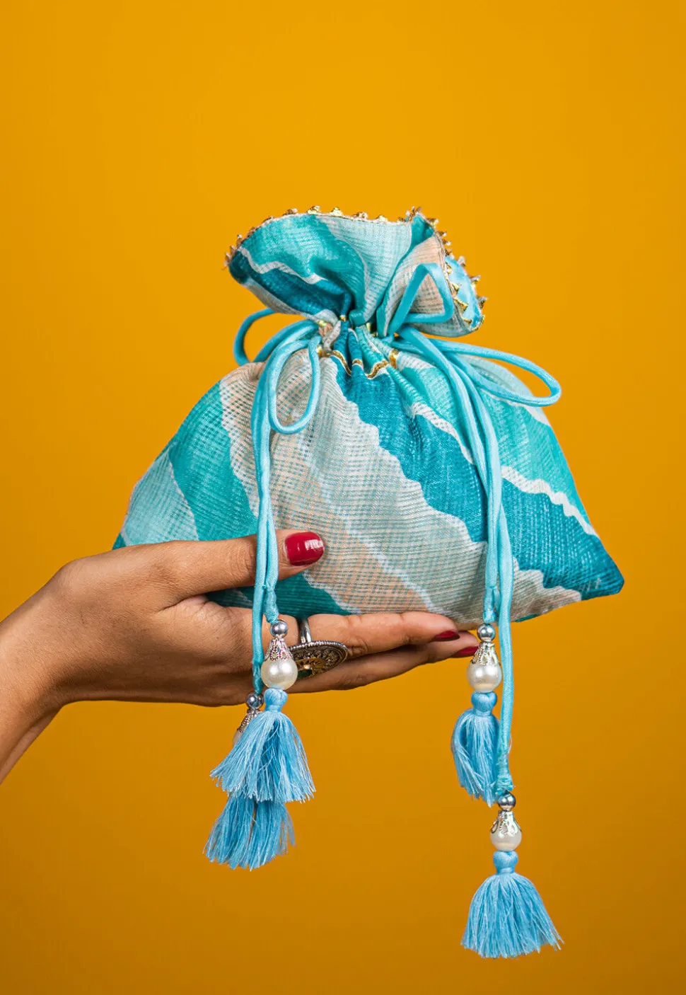 Leheriya Printed Kota Silk Potli Bag in Light Blue
