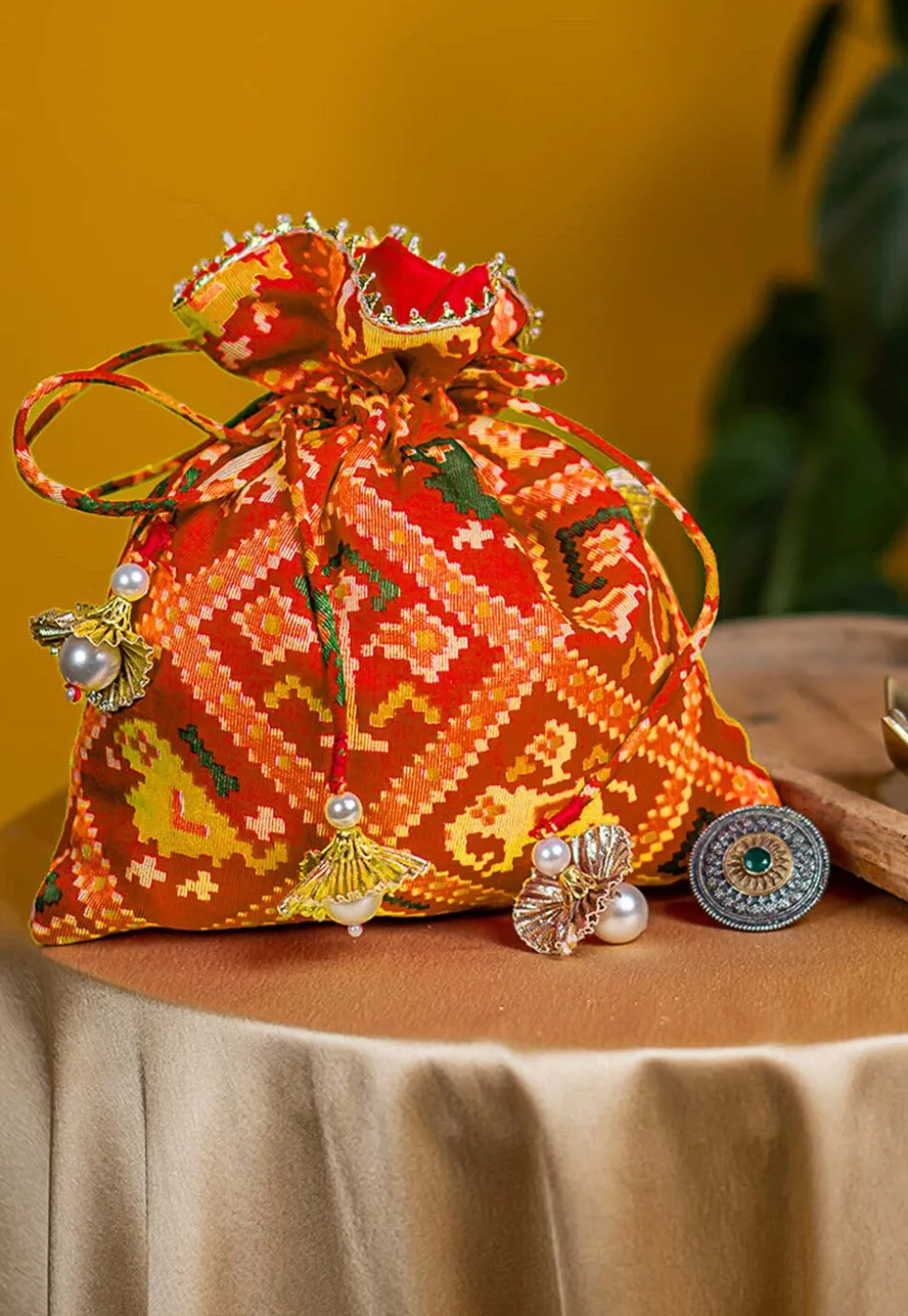 Patola Printed Art Kota Silk Potli Bag in Red