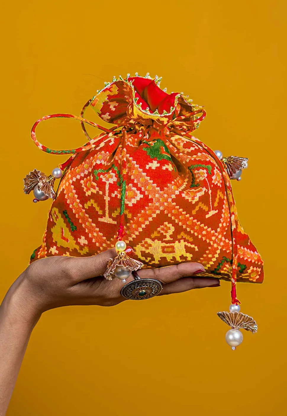Patola Printed Art Kota Silk Potli Bag in Red