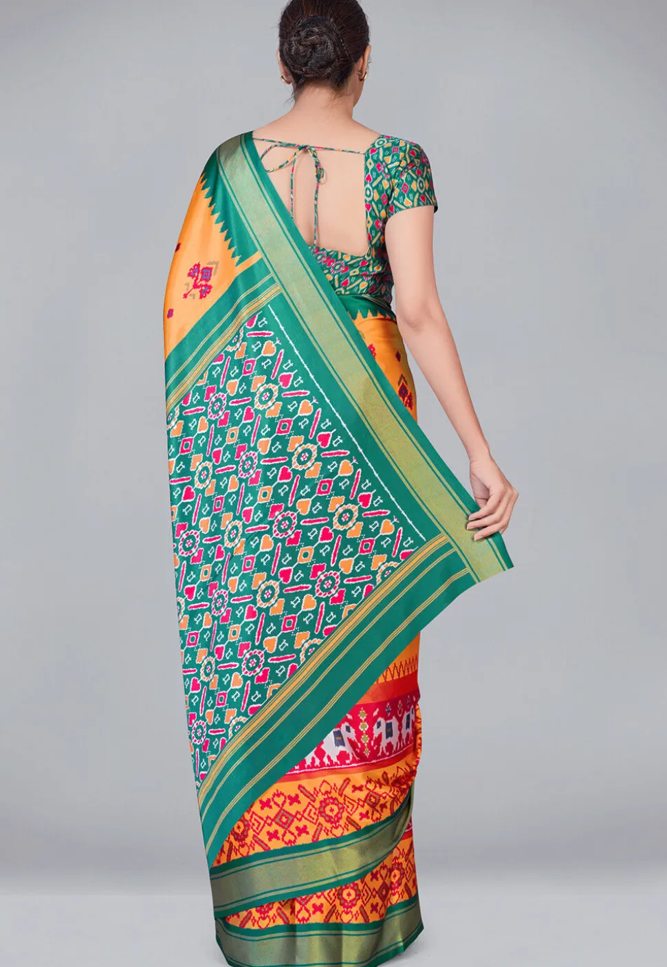 Patola Printed Crepe Saree in Light Orange