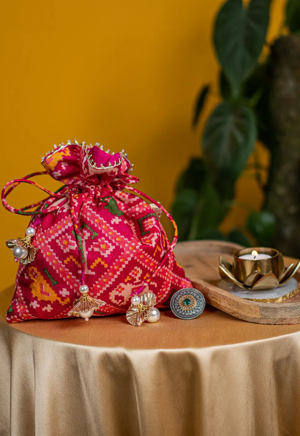Patola Printed Kota Silk Potli Bag in Fuchsia