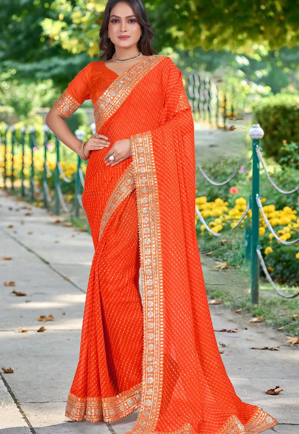 Pre-stitched Leheriya Printed Georgette Saree in Orange