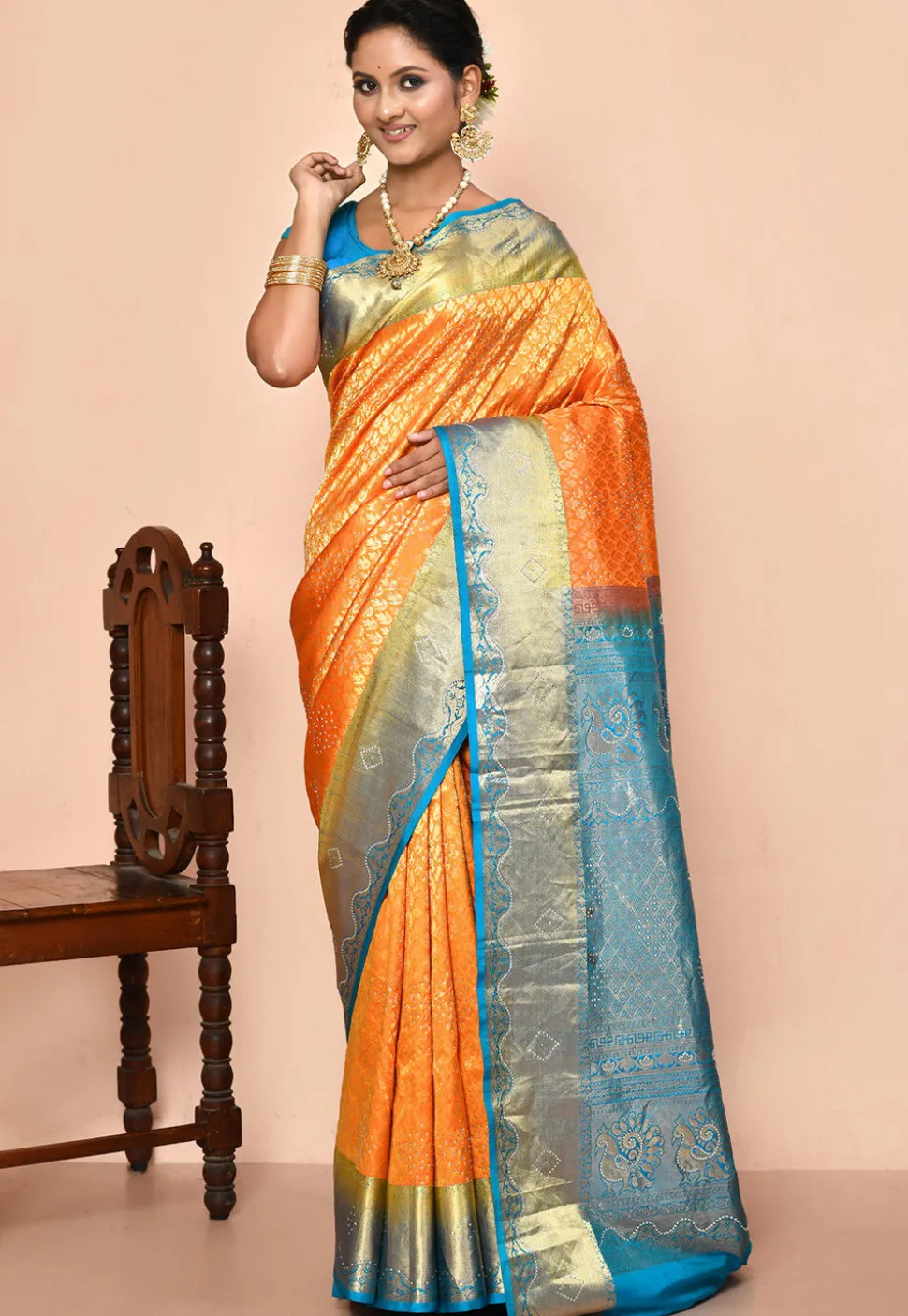 Pure Kanchipuram Silk Embellished Saree in Orange