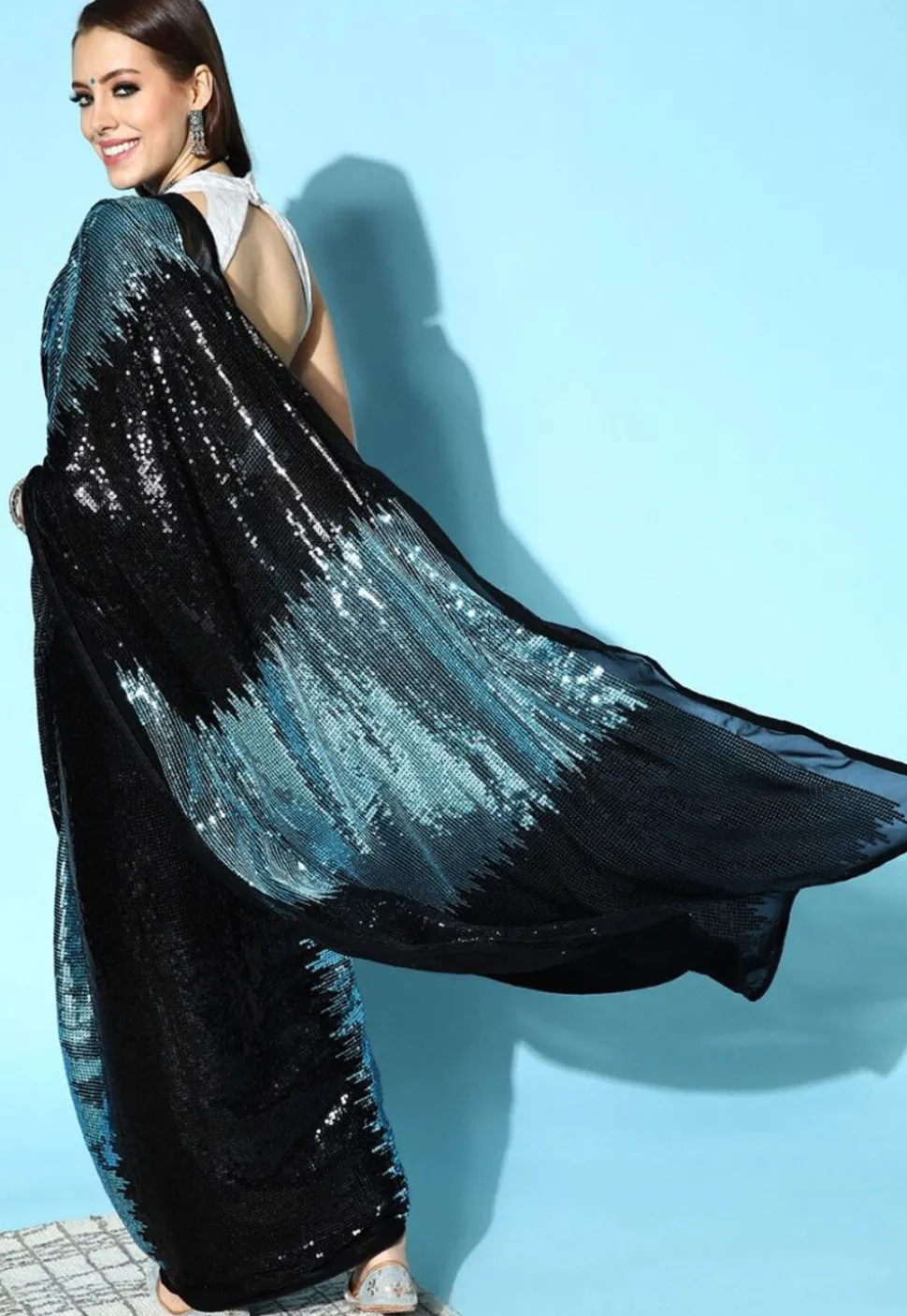 Sequinned Georgette Saree in Black and Sky Blue