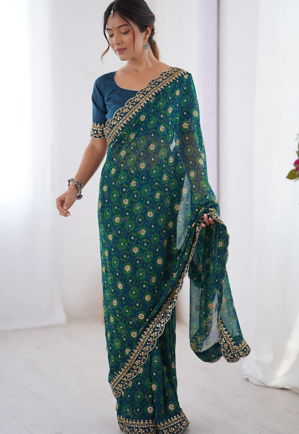 Shibhori Printed Georgette Scalloped Saree in Teal Blue