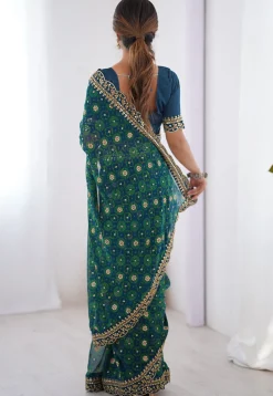 Shibhori Printed Georgette Scalloped Saree in Teal Blue