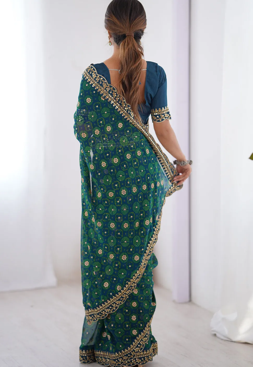 Shibhori Printed Georgette Scalloped Saree in Teal Blue