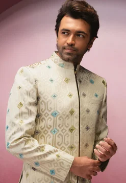 Woven Art Silk Jacquard Jodhpuri Suit in Cream